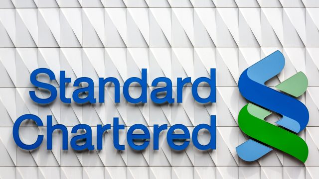 Standard Chartered share price forms giant C&H ahead of earnings